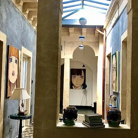 Asmundo Di Gisira Affittacamere